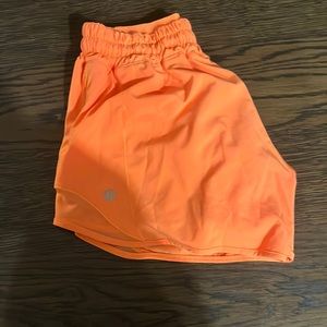 Orange Lululemon shorts